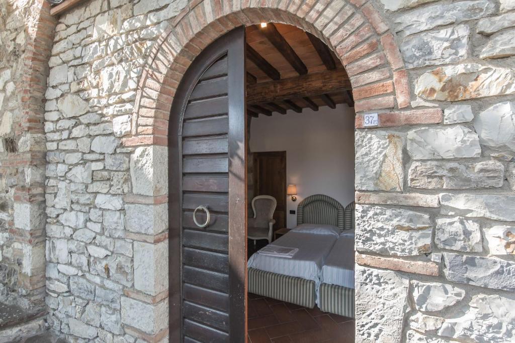 Gasthaus Relais Santa Cristina Radda in Chianti Zimmer foto